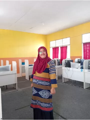 ADE IRMALIA WAULATH, S.Pd